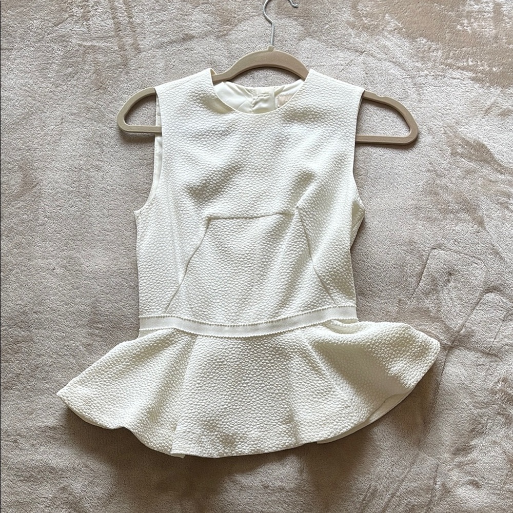 Elegant Ivory peplum top